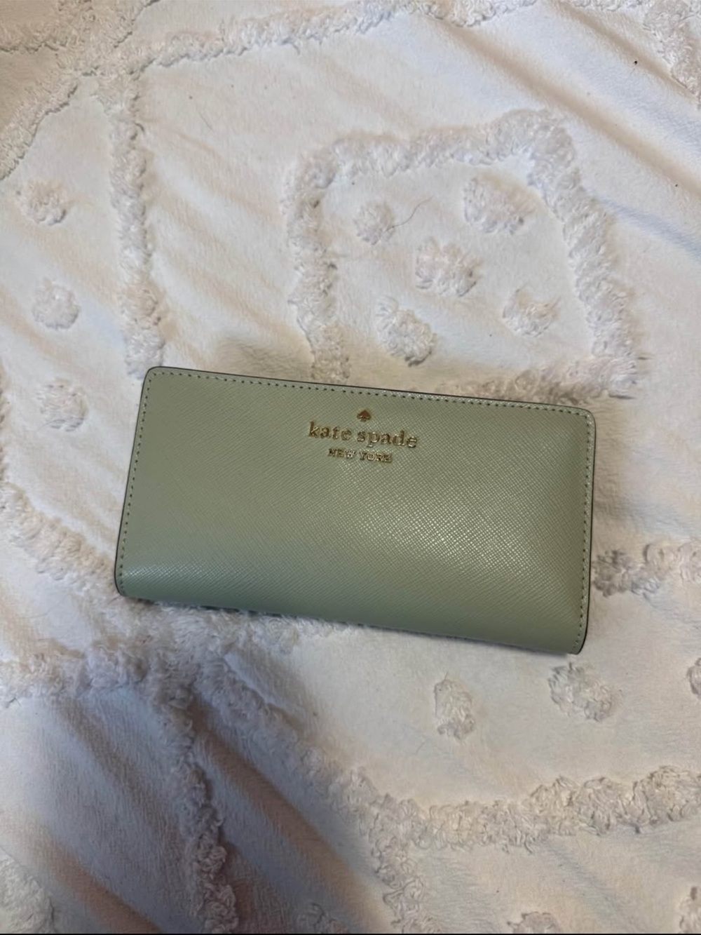 kate spade sage green leather zip-around wallet with gold logo